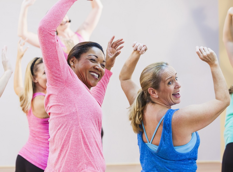 Group of multi-ethnic women in exercise class
