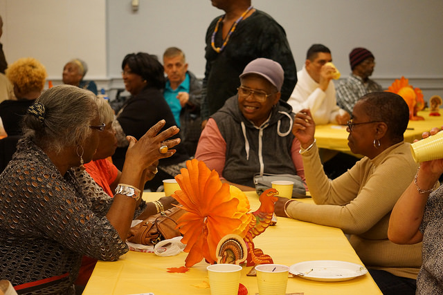 Thanksgiving dinner with chosen family at SAGE-GRIOT Innovative Senior Center of Brooklyn. Photo courtesy of SAGE. 